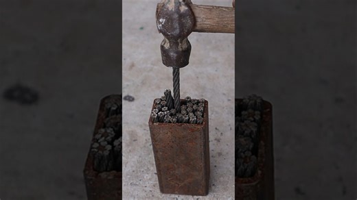 Forging steel cable into Damascus balisong blade