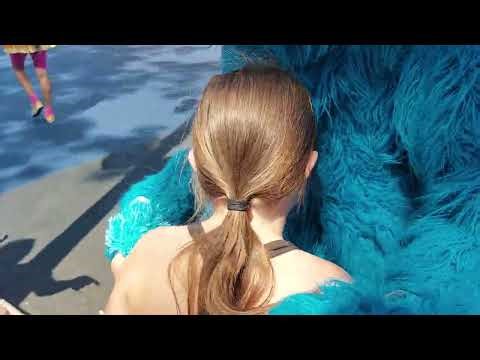 Cookie Monster Gives Big Hug to Iz Sesame Place Sea World Philadelphia