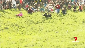 It was an unforgettable return to one of the world's greatest athletic events, except for one of the winners. Delaney Irving won the women's cheese rolling race in the UK, but likely won't remember much of it because she was knocked unconscious. 7NEWS at 6pm. More local news: 7news.com.au/news/qld #7NEWS | 7NEWS Brisbane