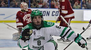 LISTEN to the magical moment when Nick Schmaltz sent North Dakota Fighting Hawks men's ice hockey to the National Championship! #FrozenFour | NCAA Hockey