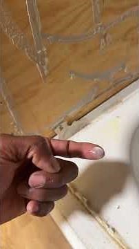How to install waterproof flooring as a tub surround.