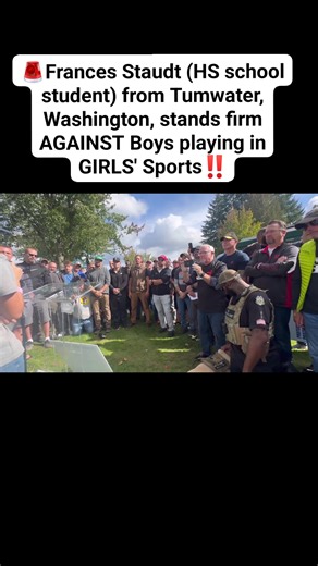 🚨16-year-old Frances Staudt, a high school athlete from Tumwater, Washington, stands resolute amidst a storm of opposition, demanding fairness in girls' sports. Surrounded by a protective circle of men, her powerful voice pierces through the cacophony of sirens blared by activists trying to drown her out. This moment captures the essence of bravery and the relentless pursuit of truth. Frances's stand comes after she forfeited a basketball game against a transgender opponent in February 2025, sp