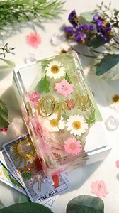 2.2K views · 59 reactions | Curious about how to DIY one box to store your tarot card with resin? We use epoxy resin to make the box body, then decorate the surface with some dried flower plants and stickers. The final craftwork is really elegant! Hope all of you enjoy this video and leave your feelings in the comment area. #letsresin #epoxyresin #resincrafts #resincrafts #tarotbox #tarotcards #resinartwork | Let's Resin | Facebook