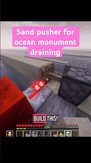 Sand pusher for draining an ocean monument