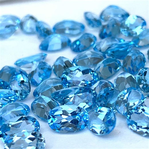 Zwitserse blauwe topaas edelsteen Kavel: 27,35 kt, 54 ovale gefacetteerde stenen - Etsy Nederland