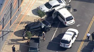 Man arrested after crashing stolen van in Kensington