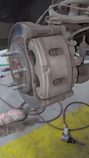 GMC Front Brake Service: How to Install New Brake Pads
