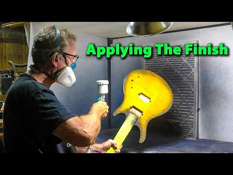 Applying The Finish On The Solid And Hollow Body Guitars