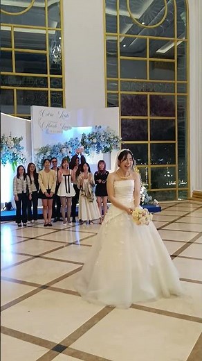 Beautiful Bride Tosses Her Wedding Bouquet