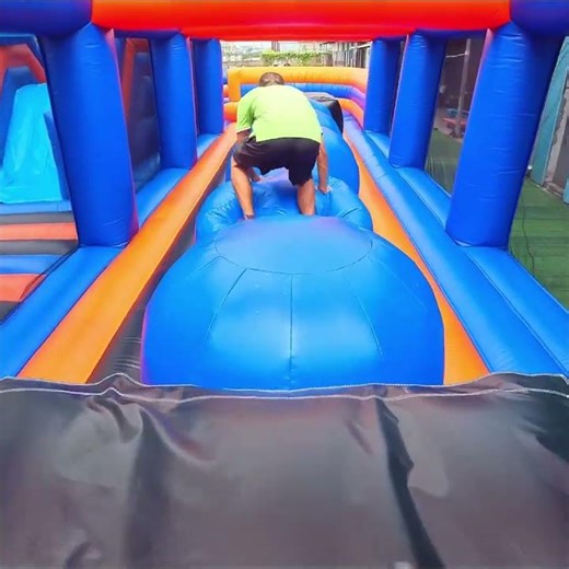 This inflatable challenge is so much fun! #obstaclecourse #inflatable #wipeout