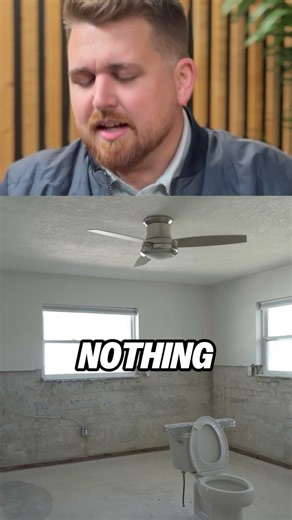 Flood cuts have been made along the walls, exposing the framing after water damage restoration work.