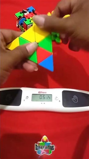 Playing Pyraminx Rubik's Cube