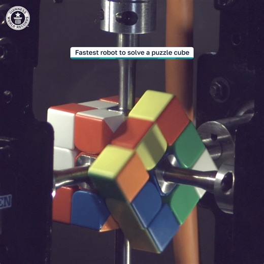188K views · 1.7K reactions | US students created the fastest robot to solve a puzzle cube | Guinness World Records | Facebook