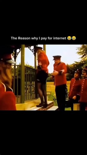 Thoda zyada on Instagram: "This video captures a lighthearted and slapstick comedic moment set in what appears to be a formal park or garden. A group of men dressed in traditional, bright red military-style uniforms are gathered near a green metal gazebo. One man, in particular, is attempting to help a woman climb over the gazebo’s railing. The scene is played for laughs, leaning into the absurd "reason why I pay for internet" meme culture that thrives on unexpected or goofy situational humor. T