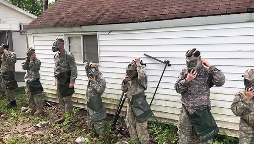 GAS MASK TRAINING - In the real Army, the gas chamber is a room that has a controlled concentration of CS (orto-chlorobenzylidene-malononitrile) gas, more commonly known as tear gas. Tear gas is the active ingredient in Mace and used for self defense and for riot control by the police. Tear gas is an irritant; specifically, it irritates mucous membranes in the eyes, nose, mouth and lungs, causing tearing, sneezing, coughing, etc. At Camp Sousley, our Recruits are trained how to properly use a ga
