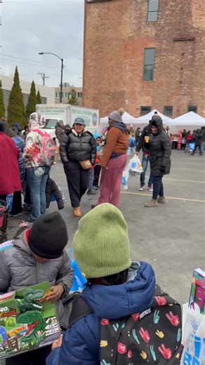 ‘69 Classmate Earl Grandberry Sr. at Annual Toy Drive Distributing Gifts.❤️🖤🐆 | DuSable High School Class of 1969
