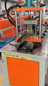 Watch as the machine seamlessly transforms raw material into fully formed shelf columns, perfect for warehouses, industrial applications, or retail storage. Maximize your production with cutting-edge technology today! | Armdax Roll Forming Machine