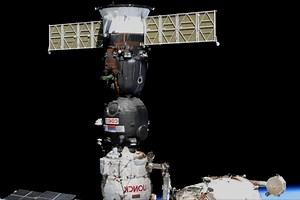 ISS crew moves one Soyuz capsule, prepares to receive unpiloted second Soyuz