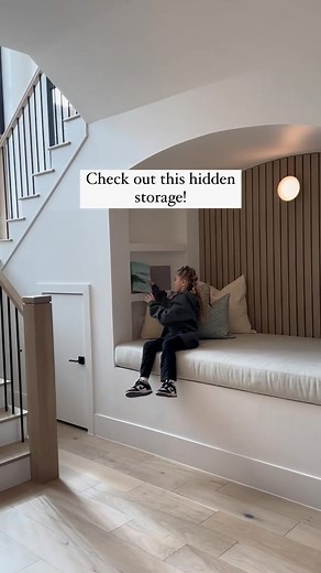 A little hidden storage area in our #elevatedviewsproject and my cute niece modeling! 😍😍😍 Build @splitrockcustomhomes | Becki Owens