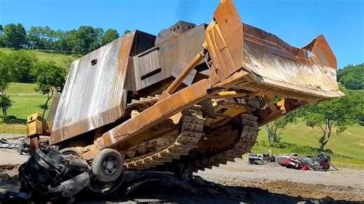 WhistlinDiesel builds replica Killdozer & offers to demolish buildings for people