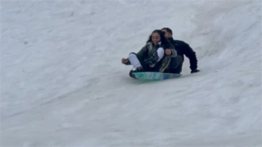Girl tries sledding and gets dragged into snow chaos