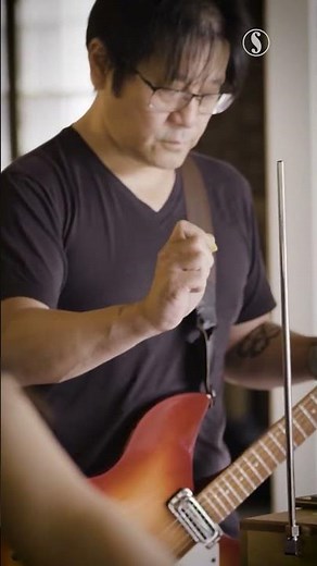 Iroiro performs using a theremin