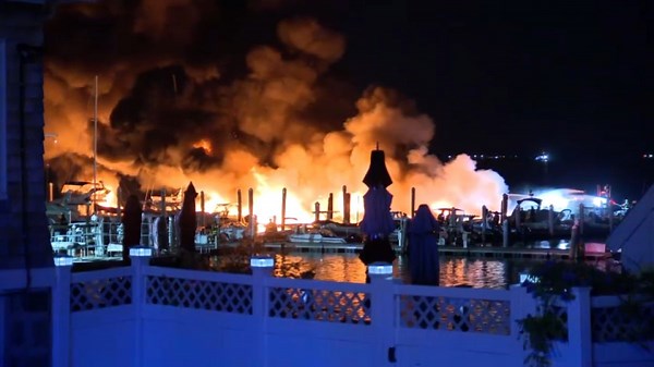Massive fire burns a dozen boats at Winthrop yacht club