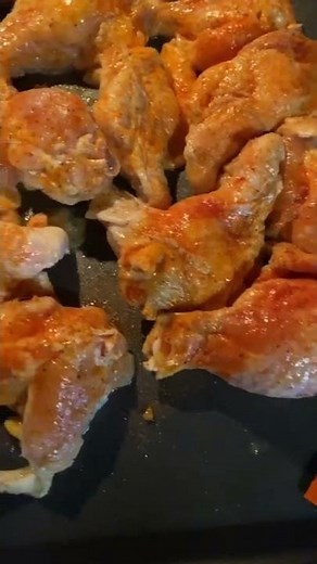 Sazon Goya seasoned chicken wings getting ready to go in the oven.