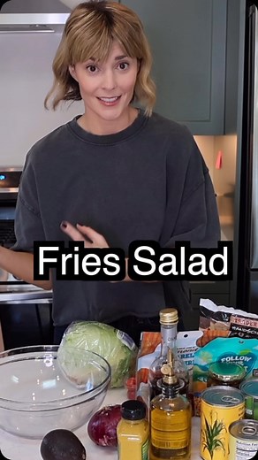 Grace Helbig on Instagram: "I reimagined one of my “recipes” from twelve years ago. I turned fried salad into fries salad. I thought it was a huge success but the jury’s still out. Link in my bio to watch the full vid 🙃"