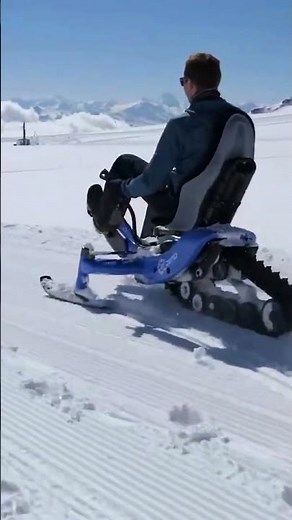 This E‑Trace Electric Snow Bike Rides Like a Snowmobile on Steroids!