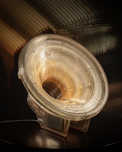 Satellite: bending light like no other ➰ Set against the dark, the Satellite reveals itself slowly, hills and valleys of low-resolution 3D printing blurring and blending warm and cool light. Originally designed around fluorescent rings in 2012, the shell has never changed. In 2020 the inside evolved — warm LEDs replacing the original bulbs, the same sentimental form remaining. Recycled plastic that learned a new trick, without forgetting the old one 🤍 #dirkvanderkooij #light #design #style