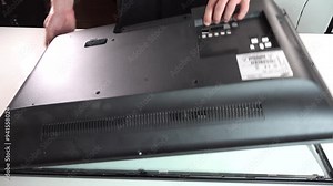 Top view of completely disassembling an old LCD TV.