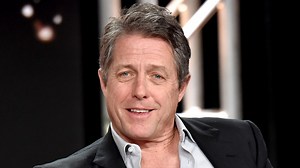 Hugh Grant behind Benny Hill theme being played during Tory MP interview