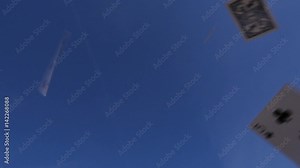 Playing cards falling through the air, slow motion