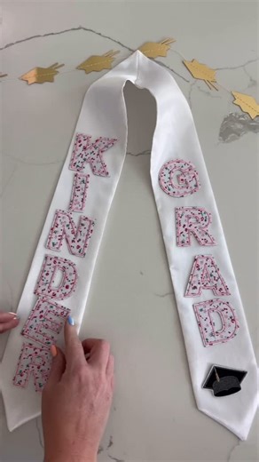 Emily Price on Instagram: "Diy Kindergarten Graduation Stole, I made the preschool version last year for my daughter and I knew she needed one for kindergarten too. This project took less than 5 minutes! Comment SHOP below to receive a DM with the link to shop this post on my LTK ⬇ https://liketk.it/5c4eO #ltkseasonal #ltkfamily #ltkkids Graduation stole, kindergarten graduation, preschool graduation, class of 25"
