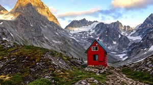 A cabin surrounded by endless wilderness