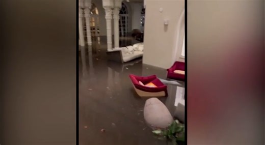 Record rainfall floods streets, strands cars in Southern Palm Beach County