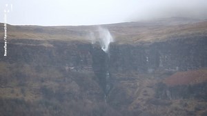 This isn't how waterfalls work! A waterfall in Ireland is seen flowing backwards as Storm Dennis hits. | Metro