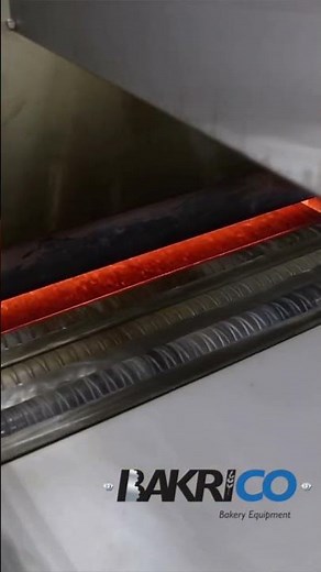 Flattened Dough Entering the Tunnel Oven: Witness the Making of Authentic Arabic Pita Bread! #shorts