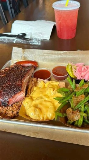 The Fatback BBQ Platter. Ribs, Pulled Pork, Shells And Cheese, Fried Green Beans And Pickled Onions