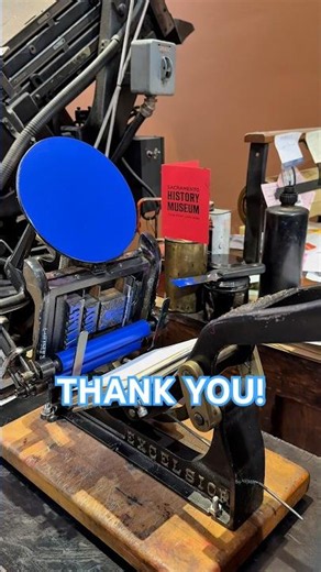 Letterpress printing some blue thank you prints with a tabletop printing press