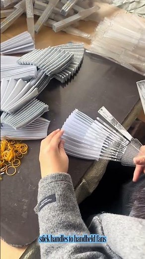 stick handles to handheld fans