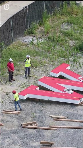 Wells Fargo installs 14-foot letters on uptown Charlotte towers