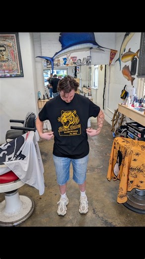 Tiger T's are flying off the shelves! Come grab one and look better than a Xmas shirt at the family BBQ! | Bare Bones Barber Shop