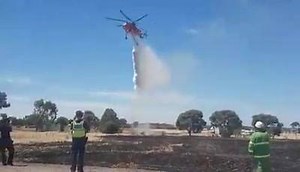 Diggers Rest, Victoria bush fire with water bombing aircraft working it's magic... Stay safe everyone !! M | Survive the Streets - Down Under