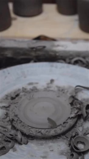 Trimming the bottom of a mug. I like to throw these as thin as possible so that I don’t have to trim much off the bottom. This trimming is more of a refinement making a small bevel under the mug and to smooth out the bottom so it doesn’t require as much sanding later. #pottery #ceramics #woodfiredpottery #potteryofinstagram #facebookreel | Curry Wilkinson pottery