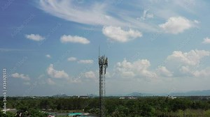 Closeup aerial view around of the telecommunications tower. On the top of a telecom tower installed antennas and transmitter wich transmits the signals of lte 5g 4g networks and mobile gsm operators.