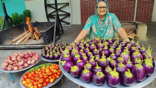 Granny makes traditional Indian spicy food for the whole village