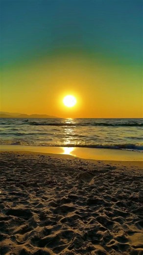 Golden Light Across Ocean Waves#naturewonder #sunset #beach