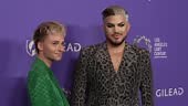 Oliver Gliese and Adam Lambert attend The Los Angeles LGBT Center...